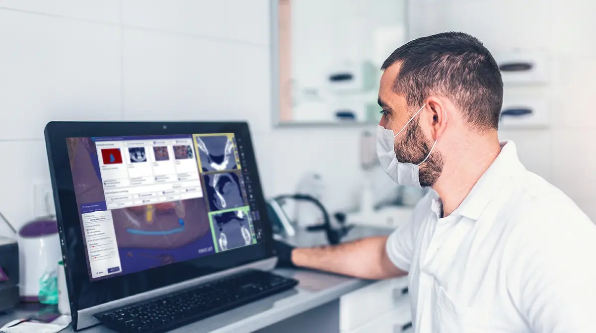 Clinician reviewing exoplan implant planning software